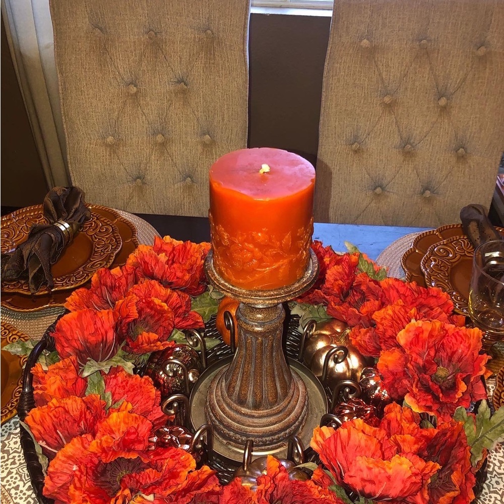 Crate and Barrel wicker tray used in model homes as display for photos.